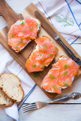 Sandwithes with smoked salmon and creamy cheese on bread