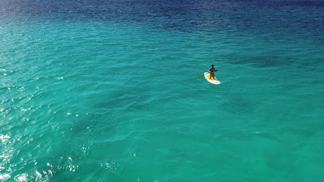 Paddle Boarding and Kayaking in Gorgeous Aquamarine Water on Sunny Day - Nassau, Bahamas