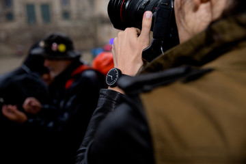 Photographer working with watch