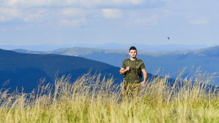 military style. male in camouflage. soldier in the field. polygon. army forces. sniper reach target...