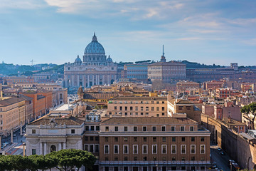 Rome rooftop city view on Vatican and dome St. Peter's cathedral. Italy