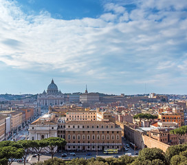 Rome rooftop city view on Vatican and dome St. Peter's cathedral. Italy