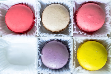 Box With Macarons Cookies Isolated On White Background.