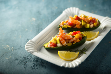 Shrimp salad served in avocado