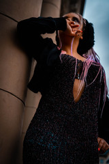 Fototapeta premium High Fashion gangsta girl model with trendy make-up at day lights. Woman with African Braids