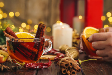 Christmas composition with Glass of glint wine on wooden table close up