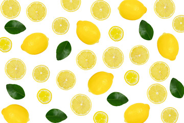 Whole and sliced yellow lemon with leaves isolated on white background.