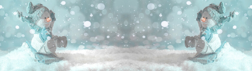 snowman sledding on snow snowflakes - winter background banner long