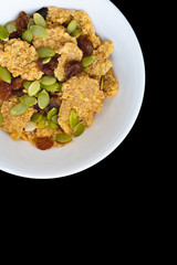 Variety of cold cereals in white bowls, quick breakfast for kids overhead shot with copyspace