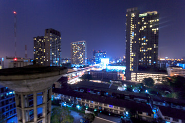 Fototapeta na wymiar blur focus. Street, building and city in the night view.