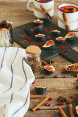 New Year composition with mulled wine on dark wooden background