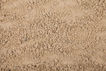 Wet construction sand as a background
