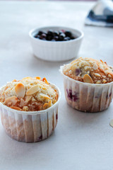  berry muffins on a light background