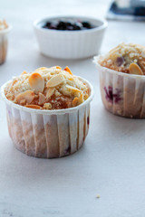  berry muffins on a light background