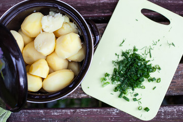 pan of boiled young potatoes with dill