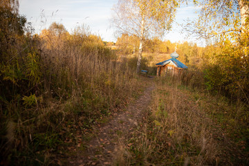 building in autumn forest