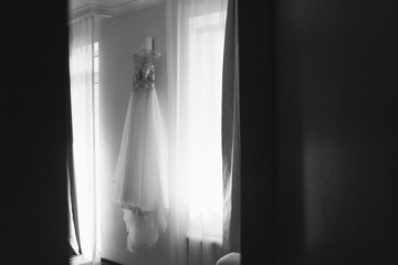 Fototapeta na wymiar Wedding dress. Dress on a hanger