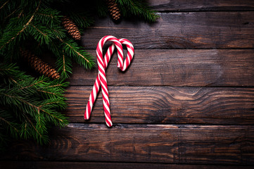 Christmas card close-up, fir tree with cones and gifts