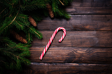 Christmas card close-up, fir tree with cones and gifts