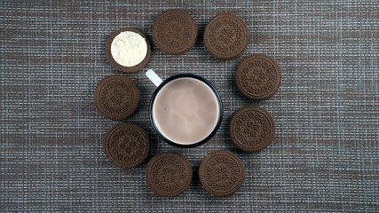 cookies with cocoa clock and place with left for inscription flatlay