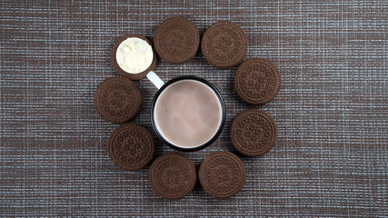 cookies with chocolate milk clock and place with left for inscription flatlay