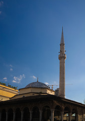 Fototapeta na wymiar Exterior view to Ethem Bey Mosque at Skanderbeg square, Tirana, Albania