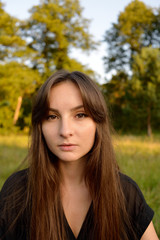 Portrait on green backdrop. Female fashion. Spring meadow. Fashion woman. Rural nature. Summer season. Sunny yellow background. Green farm.
