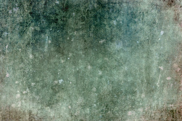 Green grungy wall background or texture