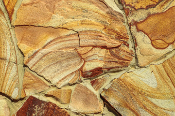 Texture of beautiful sandstone masonry of modern time. close up