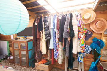 Vintage Clothing In Communal Room On Glamping Camp Site