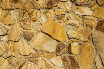 Texture of beautiful sandstone masonry of modern time. average plan