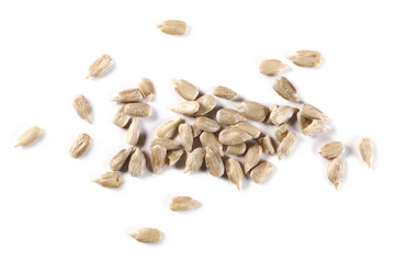 Peeled sunflower seeds isolated on white background, top view - obrazy, fototapety, plakaty