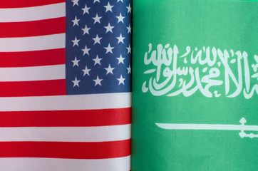 national flags of the United States and Saudi Arabia close up concept