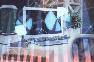 Forex Chart hologram on table with computer background. Double exposure. Concept of financial markets.