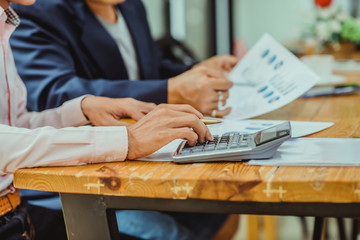 Business Corporate team brainstorming with chart and checking and analysis