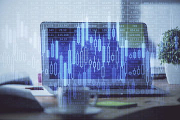 Forex market graph hologram and personal computer on background. Double exposure. Concept of investment.