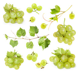 Set of fresh ripe grapes and leaves on\ white background