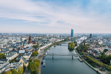 Fototapeta premium Frankfurt am Main Aerial view with drone. Looking towards the central bank. Main river flowing near Frankfurt. Frankfurt am Main Germany 30.10.2019