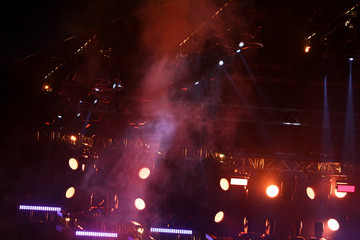 Fototapeta na wymiar Purple light on a rock concert stage as background