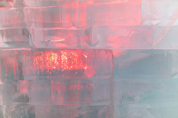 Ice bricks backlit in red as a background