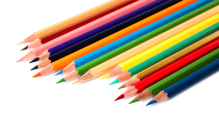 Different color pencils on white background. School stationery
