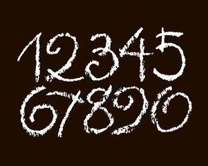 set of calligraphic pastel or chalk numbers. ABC for your design, pastel lettering on a black background