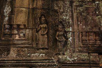 Fototapeta na wymiar Acient Murals and cave paintings on Agkor Wat temple walls