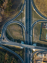 Transport junction in autumn day, aerial view from drone