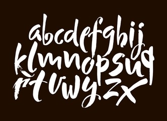 Vector Acrylic Brush Style Hand Drawn Alphabet Font. Calligraphy alphabet on a black background