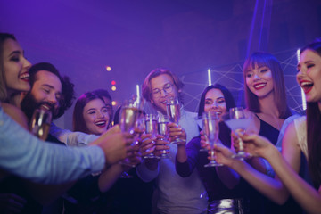 Best event abroad vacation occasion birthday concept. Close up photo of cheerful nice handsome guys chick ladies corporate work colleagues having fun free time enjoy wine beverages