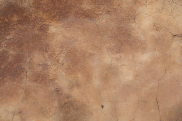 Brown grunge old cement wall background.