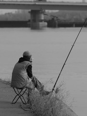 fisherman on lake
