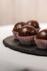 chocolate candies on white background
