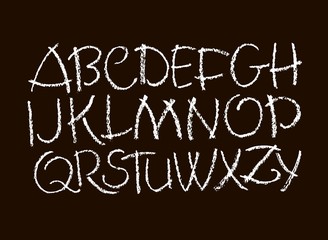 Vector Pastel or Chalk Style Hand Drawn Alphabet Font. Calligraphy alphabet on a black background